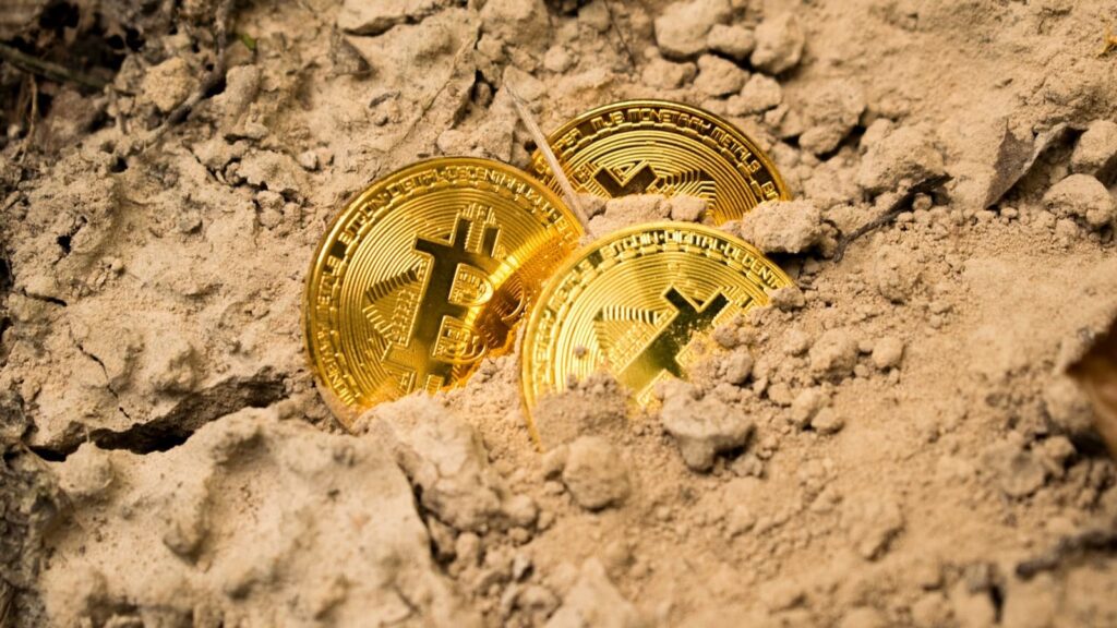 Três Bitcoins no solo - Mineração de Bitcoin